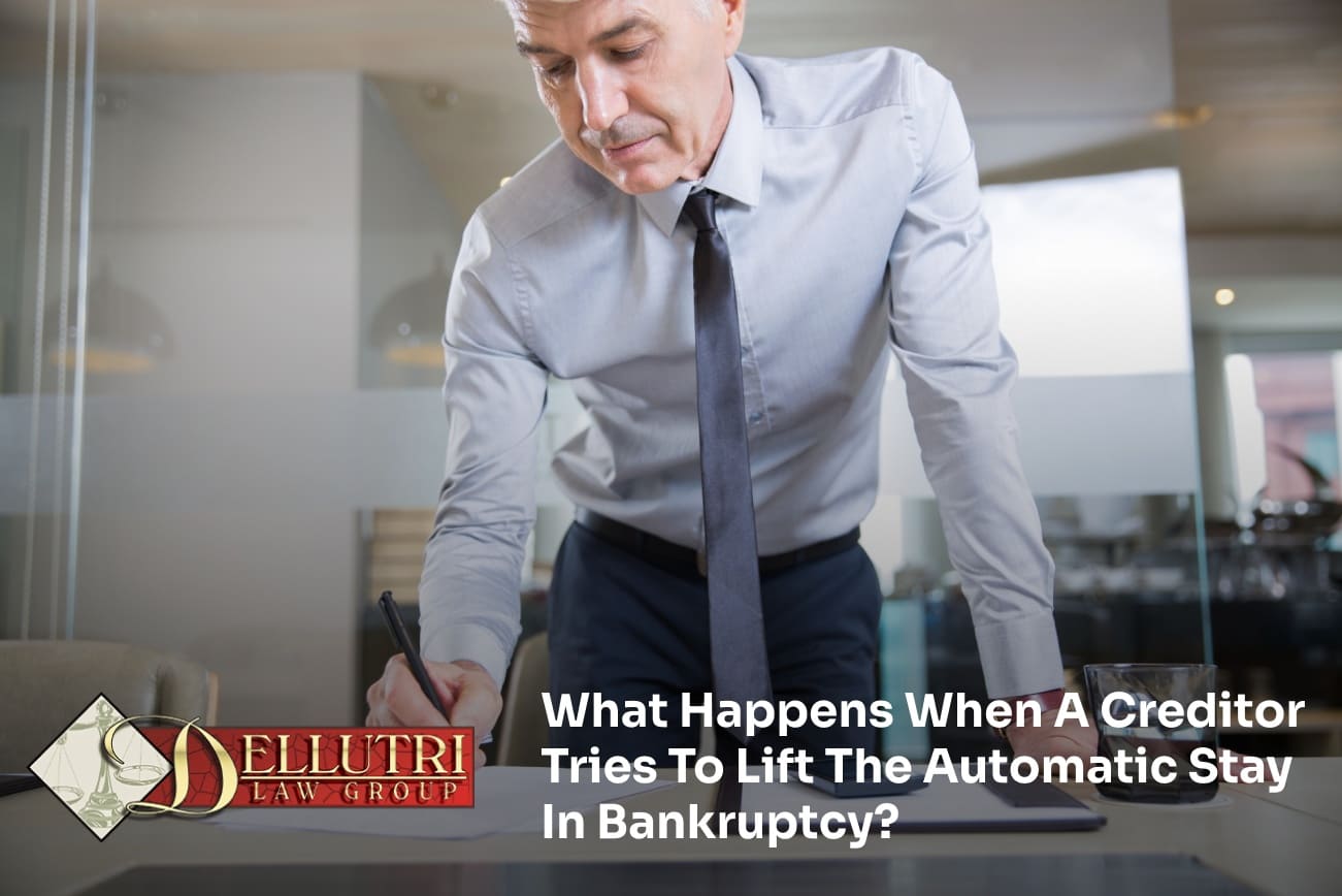 Bankruptcy attorney discussing automatic stay with client